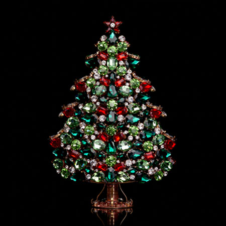 3D Christmas tree from festive colored rhinestones crystals.
